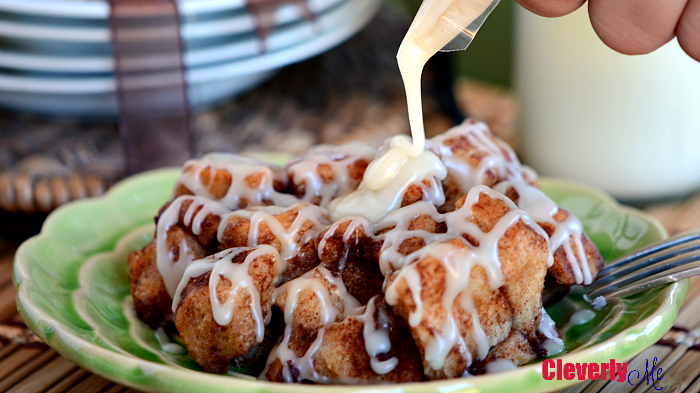 Grab a few ingredients and your Slow Cooker and prepare this easy and delicious Slow Cooker Monkey Bread Recipe, it will change your life! More at CleverlyMe.com