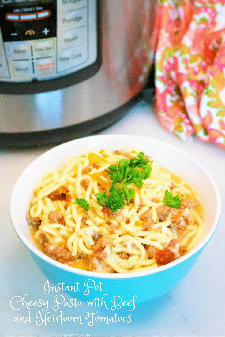 This easy Instant Pot Cheesy Pasta with Beef and Heirloom Tomatoes recipe is deliciously packed with tomatoes, onions, and beef; perfect for an easy weeknight dinner or weekend lunch. Find the recipe at CleverlyMe.com